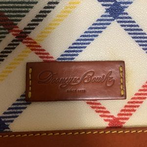 Well-loved plaid Dooney & Bourke canvas backpack